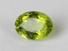Peridot Stone 6.55 Carat (7.20 Ratti) top view in natural green Oval Mix Cut