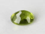 Peridot Stone 7.21 Carat (7.92 Ratti) back view with pavilion facets and symmetry
