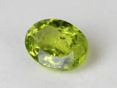 Peridot Stone 7.35 Carat (8.08 Ratti) top view in natural green Oval Mix Cut