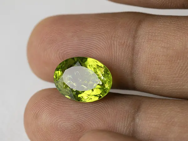 Peridot Stone 7.35 Carat (8.08 Ratti) 3 Peridot Stone 7.35 Carat (8.08 Ratti) in hand for real size and color view