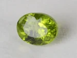 Peridot Stone 7.78 Carat (8.55 Ratti) top view in natural green Oval Mix Cut
