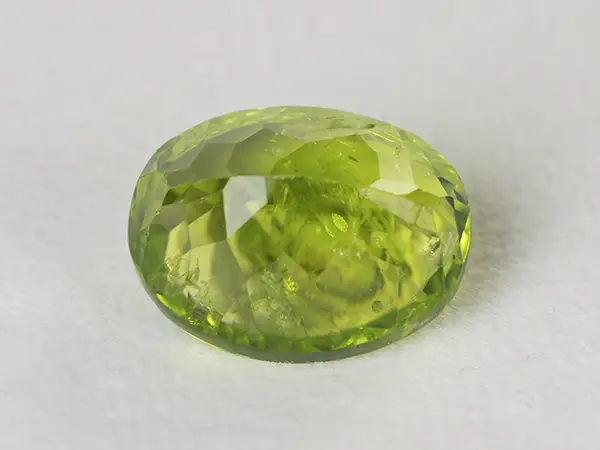 Peridot Stone 8.24 Carat (9.05 Ratti) 3 Peridot Stone 8.24 Carat (9.05 Ratti) back view with pavilion facets and symmetry