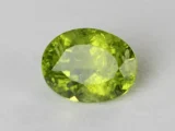 Peridot Stone 8.24 Carat (9.05 Ratti) top view in natural green Oval Mix Cut