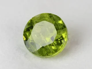 Peridot Stone 8.25 Carat (9.07 Ratti) overhead in natural green Round Cut