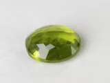 Peridot Stone 9.26 Carat (10.18 Ratti) back view, pavilion facets and symmetry visible