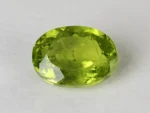 Peridot Stone 9.28 Carat (10.20 Ratti) top view in natural green Oval Mix Cut