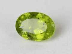Peridot Stone 9.35 Carat (10.27 Ratti) overhead in natural green Oval Mix Cut