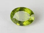 Peridot Stone 9.73 Carat (10.69 Ratti) top view in natural green Oval Mix Cut