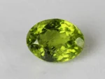 Peridot Stone 9.98 Carat (10.97 Ratti) top view in natural green Oval Mix Cut