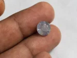 Ceylon Blue Sapphire (Neelam) 5.87 Carat (6.45 Ratti) in hand for real-world scale and tone
