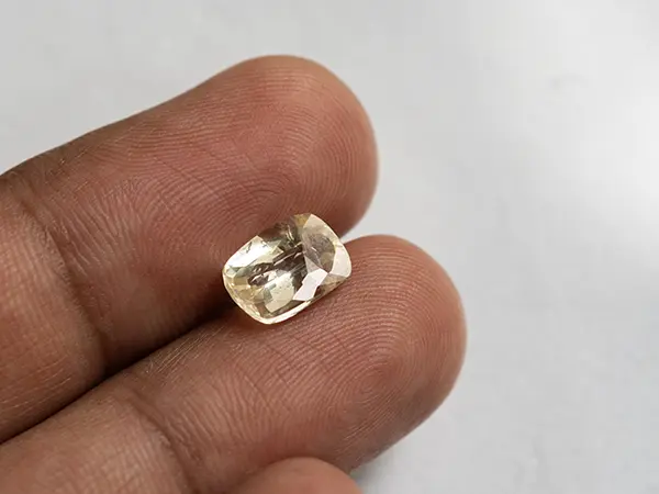 Ceylon Yellow Sapphire (Pukhraj) 3.18 Carat (3.49 Ratti) 4 Ceylon Yellow Sapphire 3.18 ct (3.49 Ratti) in hand for true scale and tone