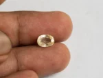 Ceylon Yellow Sapphire 3.2 ct (3.52 Ratti) in hand for true scale and tone