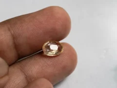 Ceylon Yellow Sapphire 3.29 ct (3.62 Ratti) in hand for true scale and tone