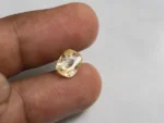 Ceylon Yellow Sapphire 3.64 ct (4.00 Ratti) in hand for true scale and tone