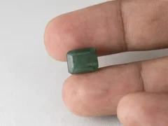 Zambian Emerald 5.42 Carat (5.96 Ratti) Panna Stone in hand for true scale and color