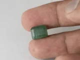 Zambian Emerald 5.75 Carat (6.32 Ratti) Panna Stone in hand for true scale and color