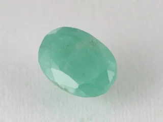 Zambian Emerald 6.16 Carat (6.77 Ratti) Panna Stone top view, vivid green oval