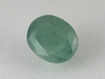 Zambian Emerald 7.15 Carat (7.86 Ratti) Panna Stone top view, vivid green oval