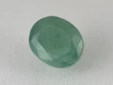 Zambian Emerald 7.15 Carat (7.86 Ratti) Panna Stone top view, vivid green oval