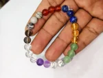 Navratna Bracelet — Multicolor Quartz (Elastic) in hand for true scale and shine