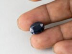 Bangkok Blue Sapphire Neelam 10.28 Carat in hand showing real size 14mm spread