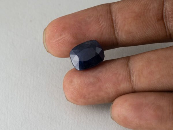 Bangkok Blue Sapphire (Neelam) 12.86 Carat (14.13 Ratti) in hand for real size and colour reference