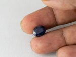 Bangkok Blue Sapphire Neelam 6.03 Carat in hand showing real size 11.1mm length