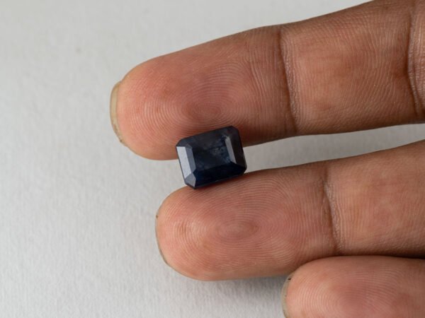 Bangkok Blue Sapphire Neelam 6.22 Carat in hand showing real size 10.7mm spread