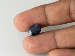 Bangkok Blue Sapphire Neelam 6.4 Carat in hand showing real size 12.1mm spread