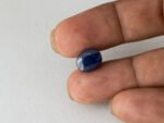 Bangkok Blue Sapphire Neelam 6.84 Carat in hand showing real size 11.4mm spread