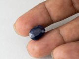 Bangkok Blue Sapphire Neelam 7.82 Carat in hand showing real size 13.8mm spread