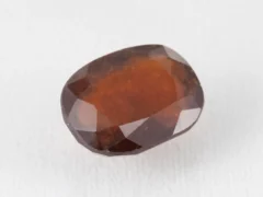 Hessonite Garnet 11.6 Carat side view showing 6.4mm depth and cut quality.