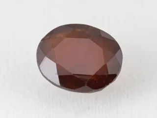 African Gomed Stone 12.2 Carat natural Hessonite with brown colour, oval cut.