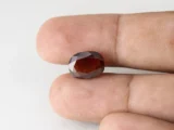 Gomed Stone 5.8 Carat in hand showing real 12.5mm size.