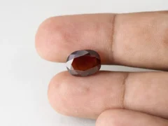 Gomed Stone 5.8 Carat in hand showing real 12.5mm size.