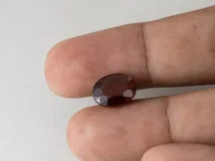 African Gomed Hessonite 6 Carat in hand showing real size 12.5mm