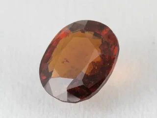 African Gomed Stone 6.6 Carat natural Hessonite with brown colour, oval cut.