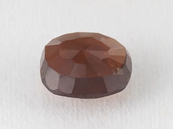 African Gomed Stone 6.66 Carat (7.32 Ratti) Natural Certified Hessonite 3 Natural Gomed 6.66 Carat back view showing pavilion facets.