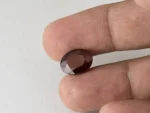African Gomed Hessonite 6.66 Carat in hand showing 13.3mm size