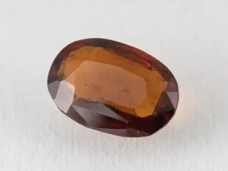 African Gomed Stone 7.75 Carat natural Hessonite with brown colour, oval cut.
