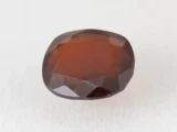 Hessonite Garnet 8.7 Carat side view showing 5.9mm depth and cut quality.