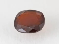 Hessonite Garnet 8.7 Carat side view showing 5.9mm depth and cut quality.