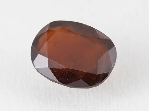 African Gomed Stone 9 Carat (9.89 Ratti) Natural Certified Hessonite 1 African Gomed Stone 9 Carat natural Hessonite with brown colour, oval cut.