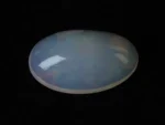 Natural Ethiopian Fire Opal 10.50 carat elongated oval white with rainbow play-of-color