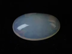 Natural Ethiopian Fire Opal 10.50 carat elongated oval white with rainbow play-of-color