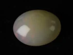 Natural Ethiopian Fire Opal 11.06 carat oval white with rainbow play-of-color