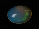 Ethiopian Fire Opal 4.10 Carat natural certified oval cut loose gemstone with rainbow play-of-color