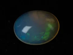 Ethiopian Fire Opal 4.10 Carat natural certified oval cut loose gemstone with rainbow play-of-color