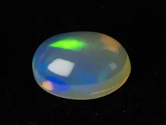 Ethiopian Fire Opal 4.73 Carat natural certified oval cut loose gemstone with play-of-color