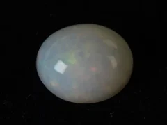 Ethiopian Fire Opal 6.60 Carat natural certified oval cut loose gemstone with vivid play-of-color